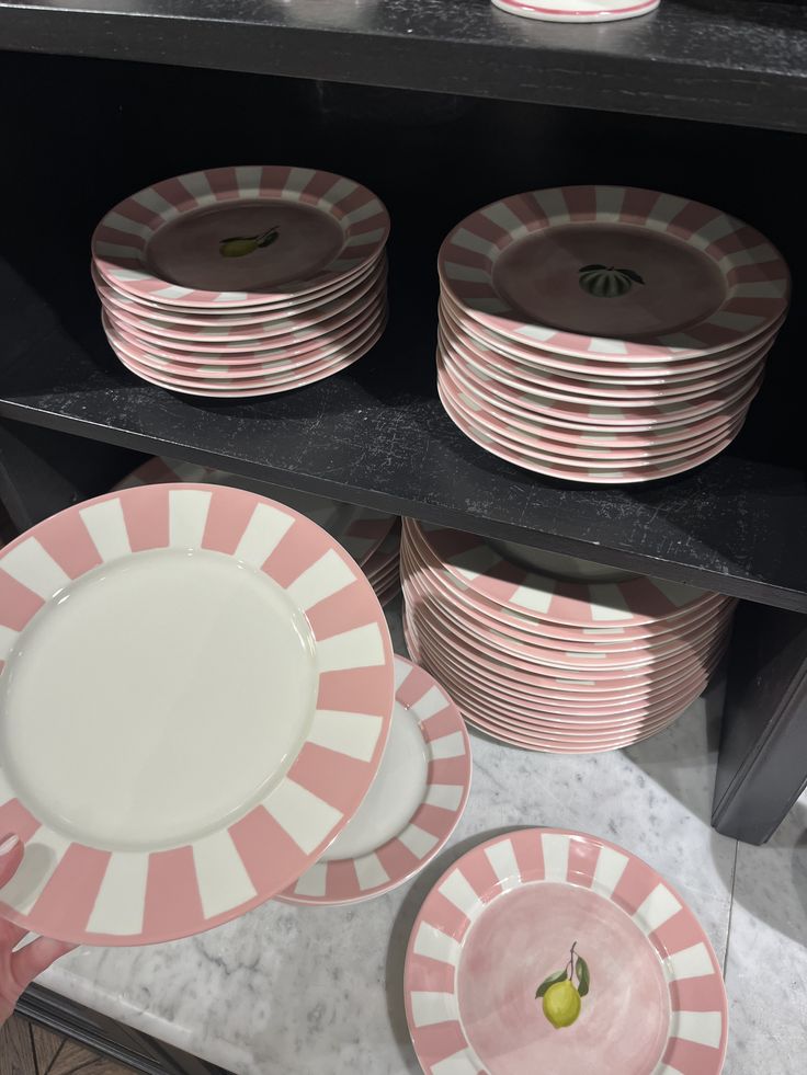 Petite plates arranged on open shelving